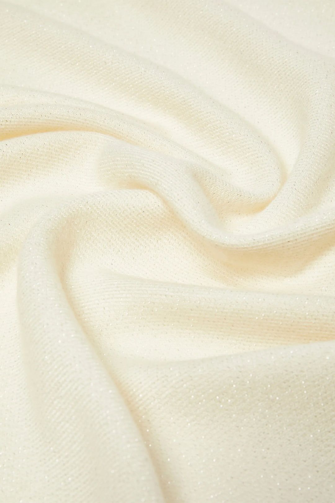 Close-up of smooth, beige fabric texture