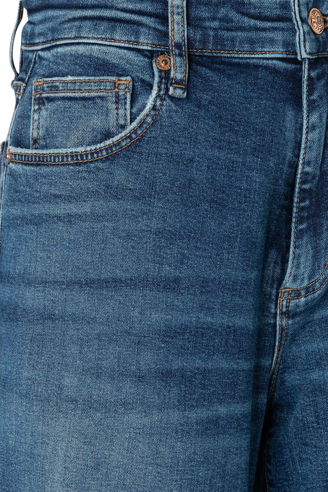 Close-up of blue jeans with a focus on the pocket and stitching.