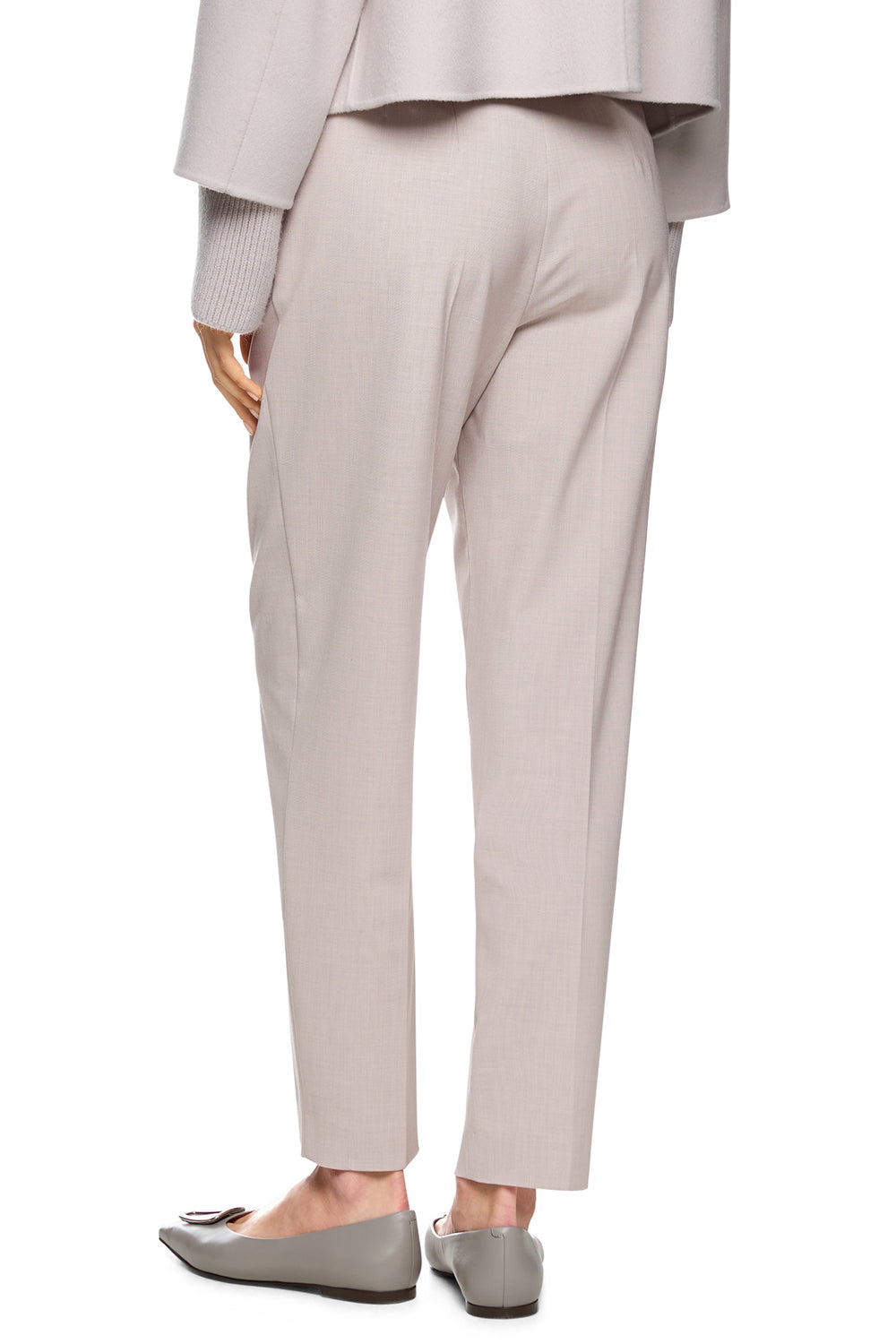 Light gray suit with pants and shoes on a white background