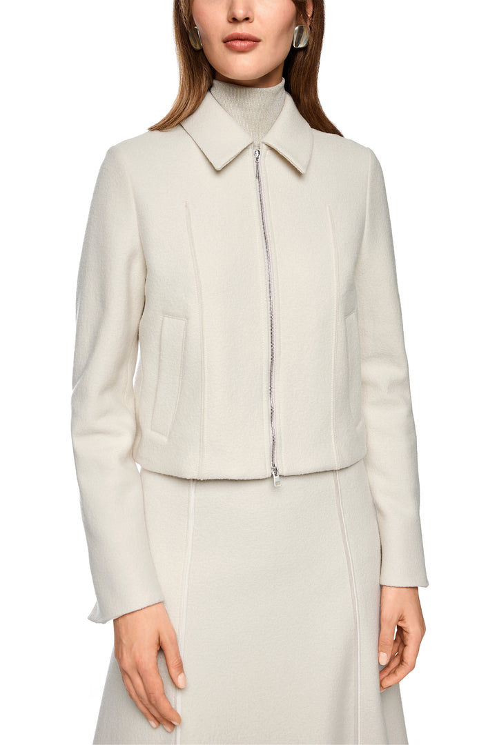 Light gray jacket worn by a model on a white background