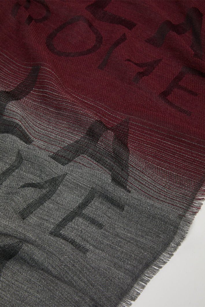 Gray and red scarf with 'Vale' branding on a white background