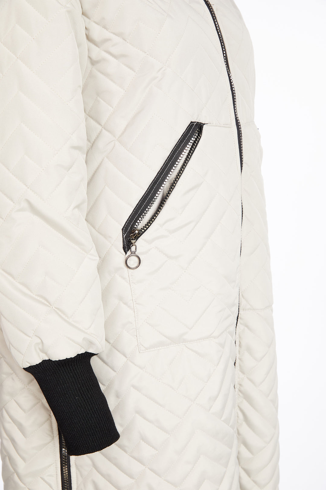 Taupe quilted jacket with a black zipper on a white background