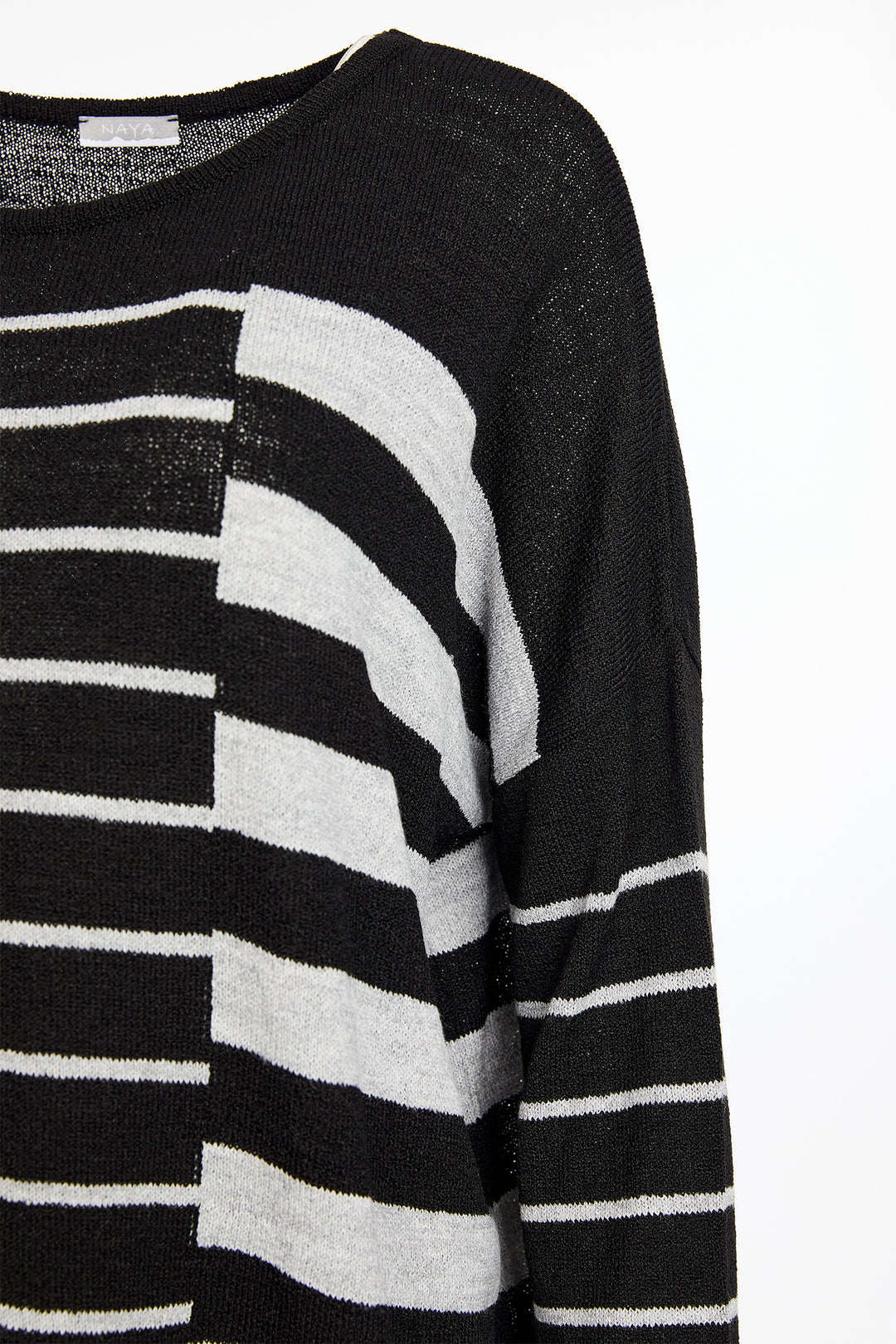Black and white striped sweater on a white background