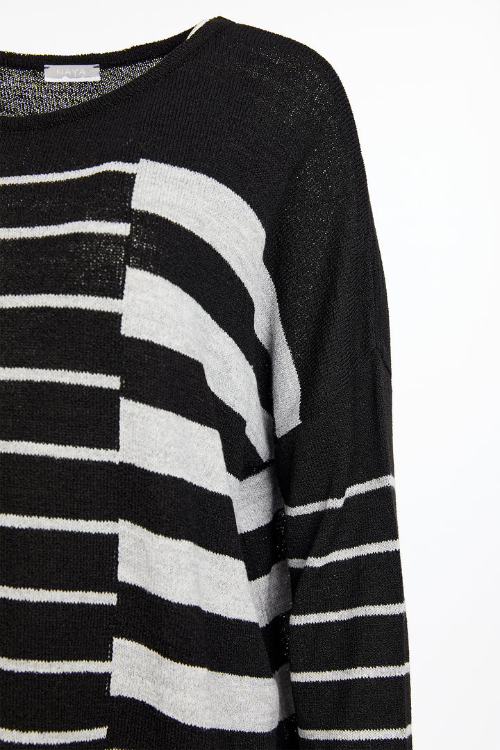 Black and white striped sweater on a white background