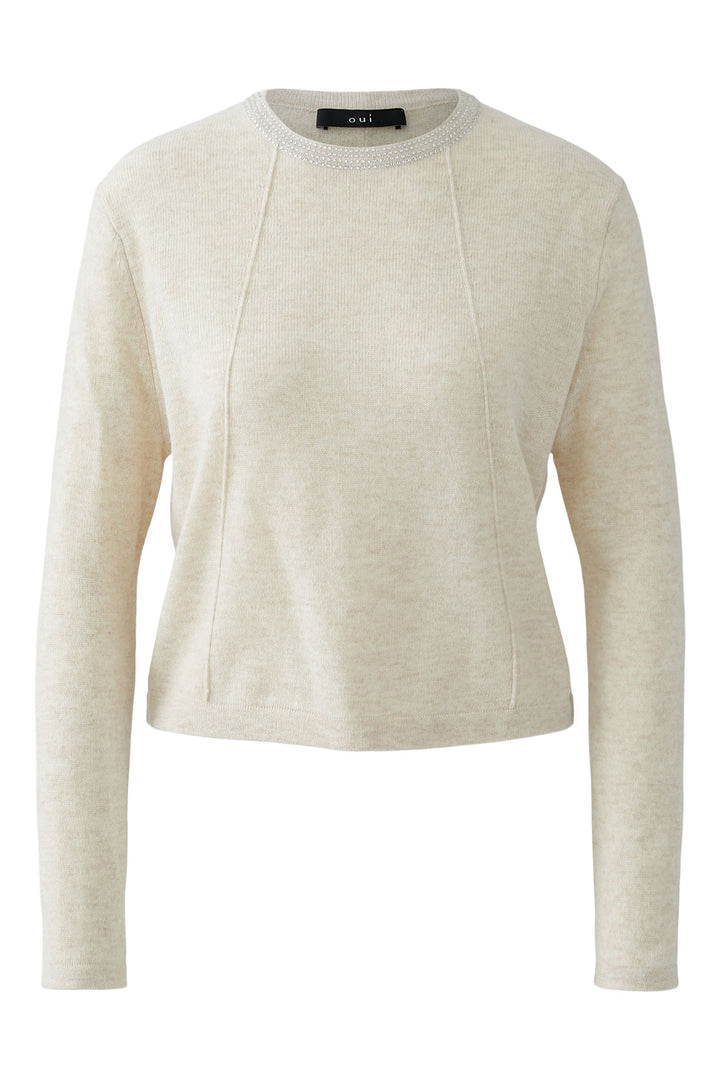 Beige sweater on a white background