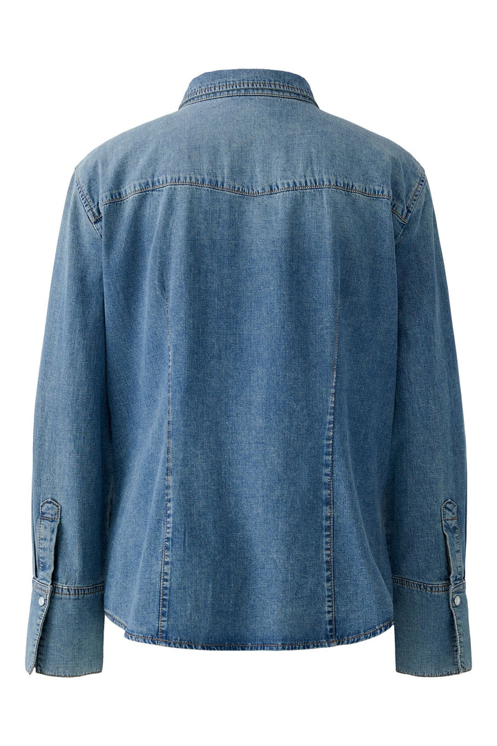 Blue denim jacket on a white background