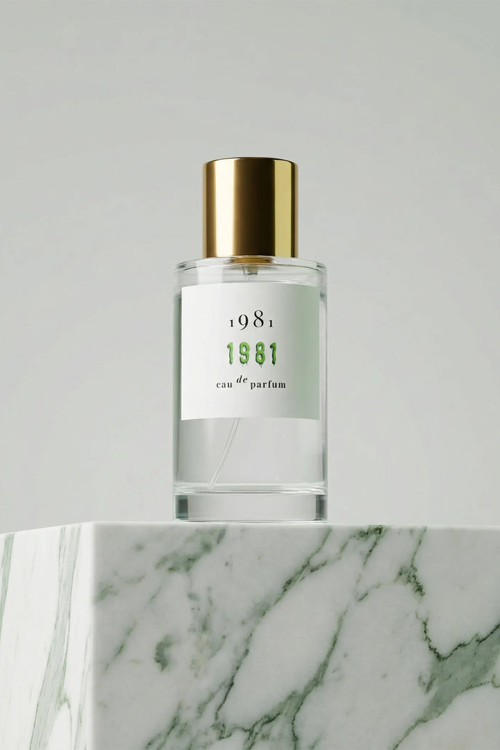 1981 Fragrance 1981 Eau De Parfum 100ml, bottle front on green marble