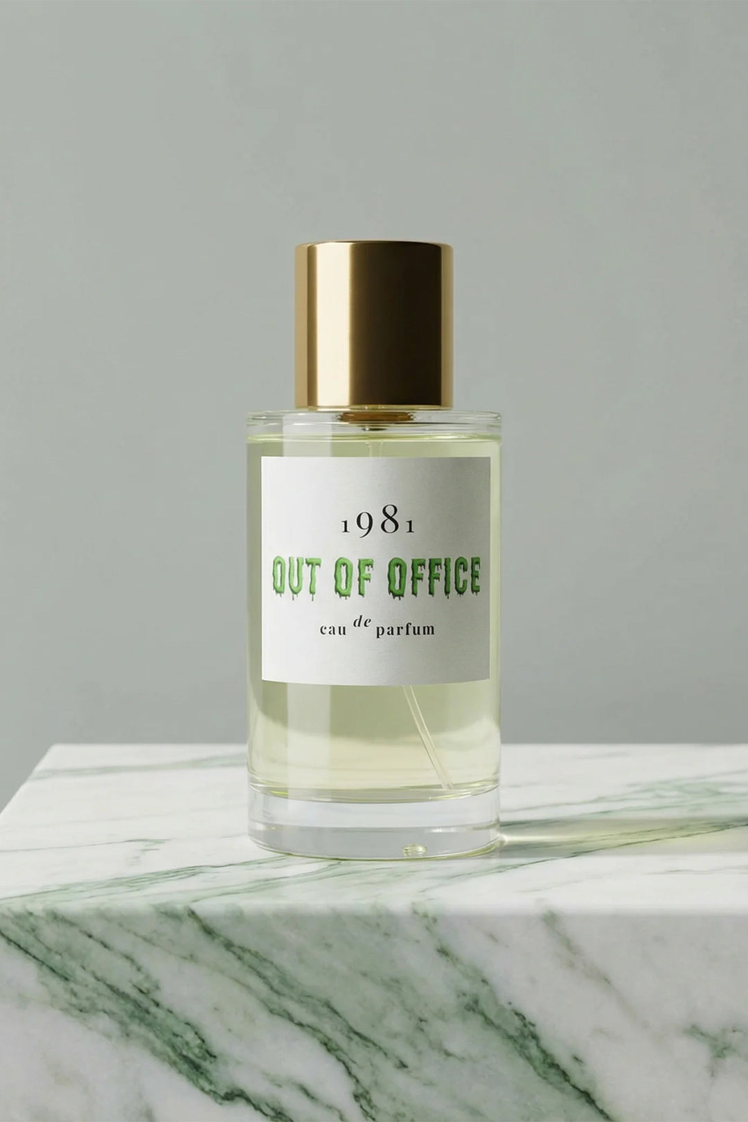 1981 Fragrance Out Of Office Eau De Parfum 100ml, bottle front on green marble