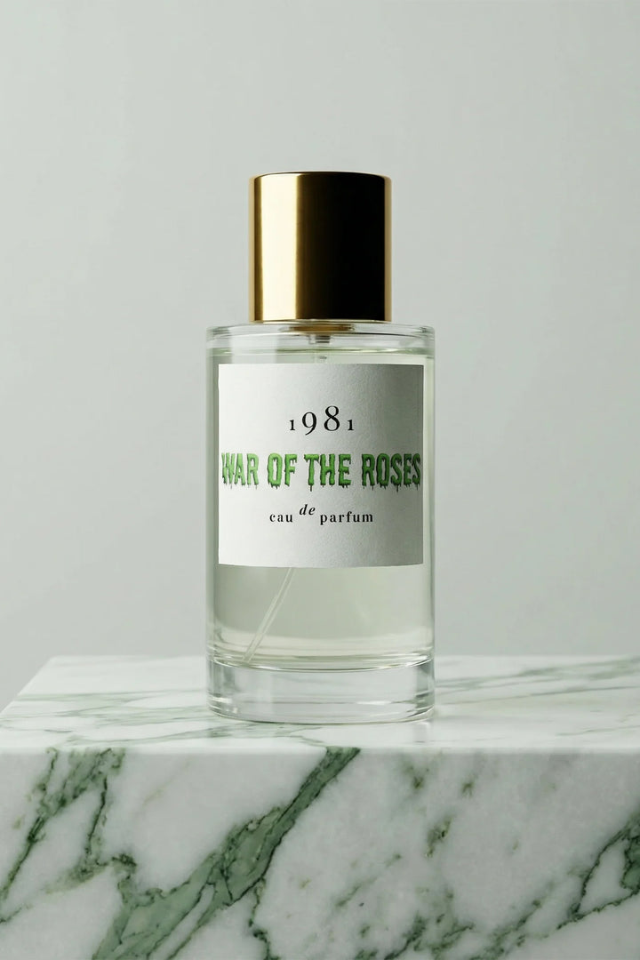 1981 Fragrance War Of The Roses Eau De Parfum 100ml, bottle front on green marble