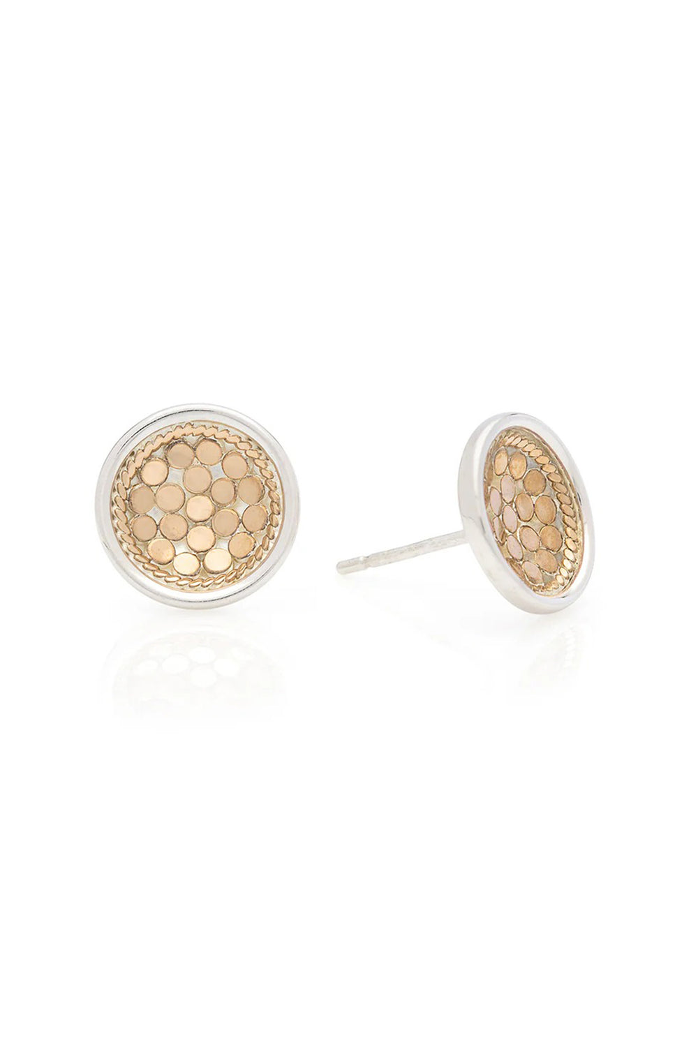 Gold earrings with intricate design on a white background