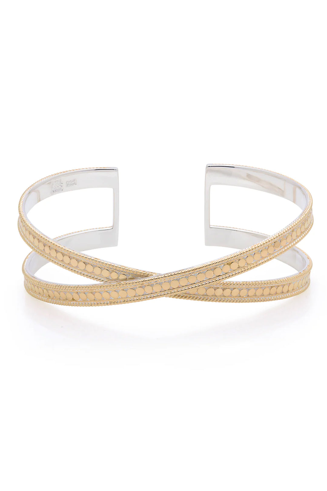 Two gold bracelets on a white background