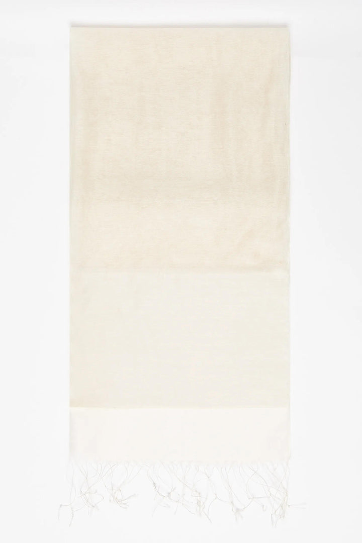 Gradient towel transitioning from light beige to white on a white background
