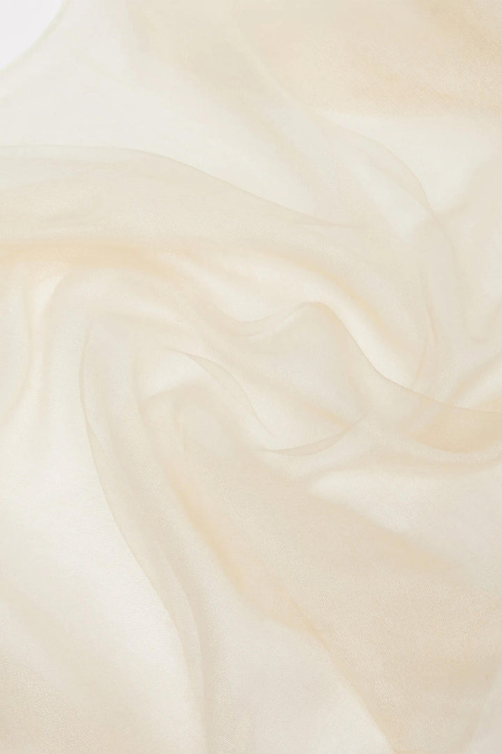 Close-up of smooth, beige fabric texture