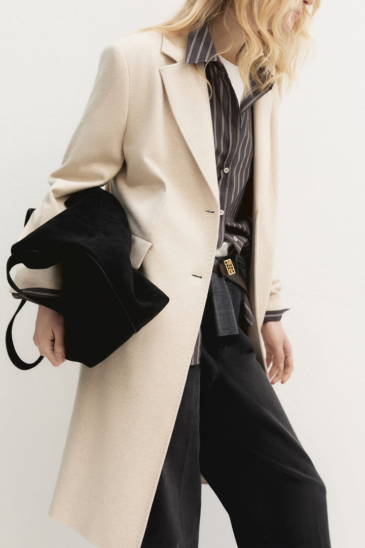 Emme Ivory White Plain Brushed Jacquard Jersey Coat, front model shot three-quarter view