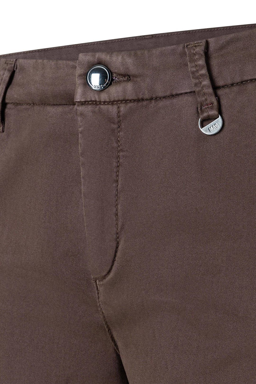 Close-up of brown pants with button and zipper details