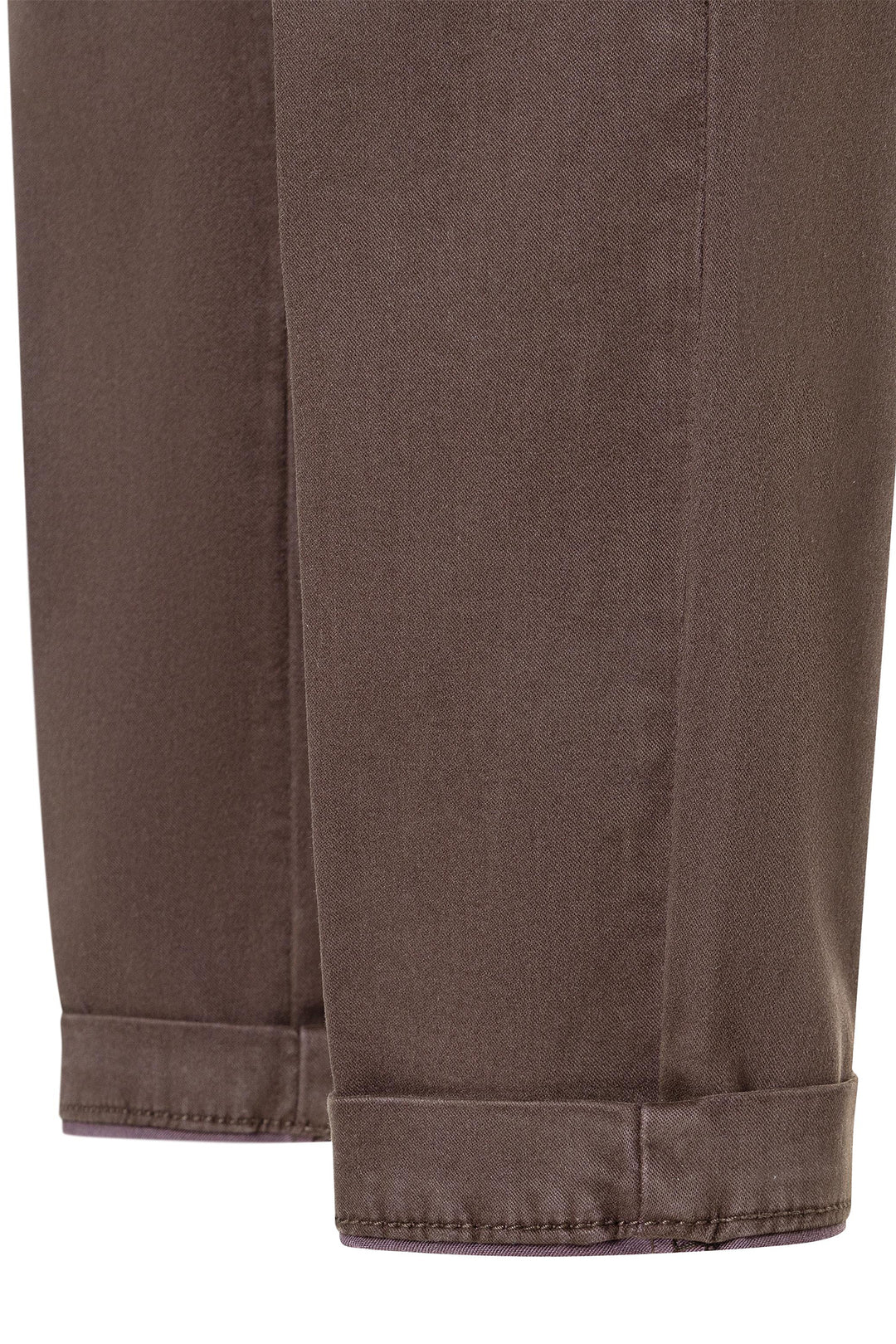Close-up of brown pants with a white background
