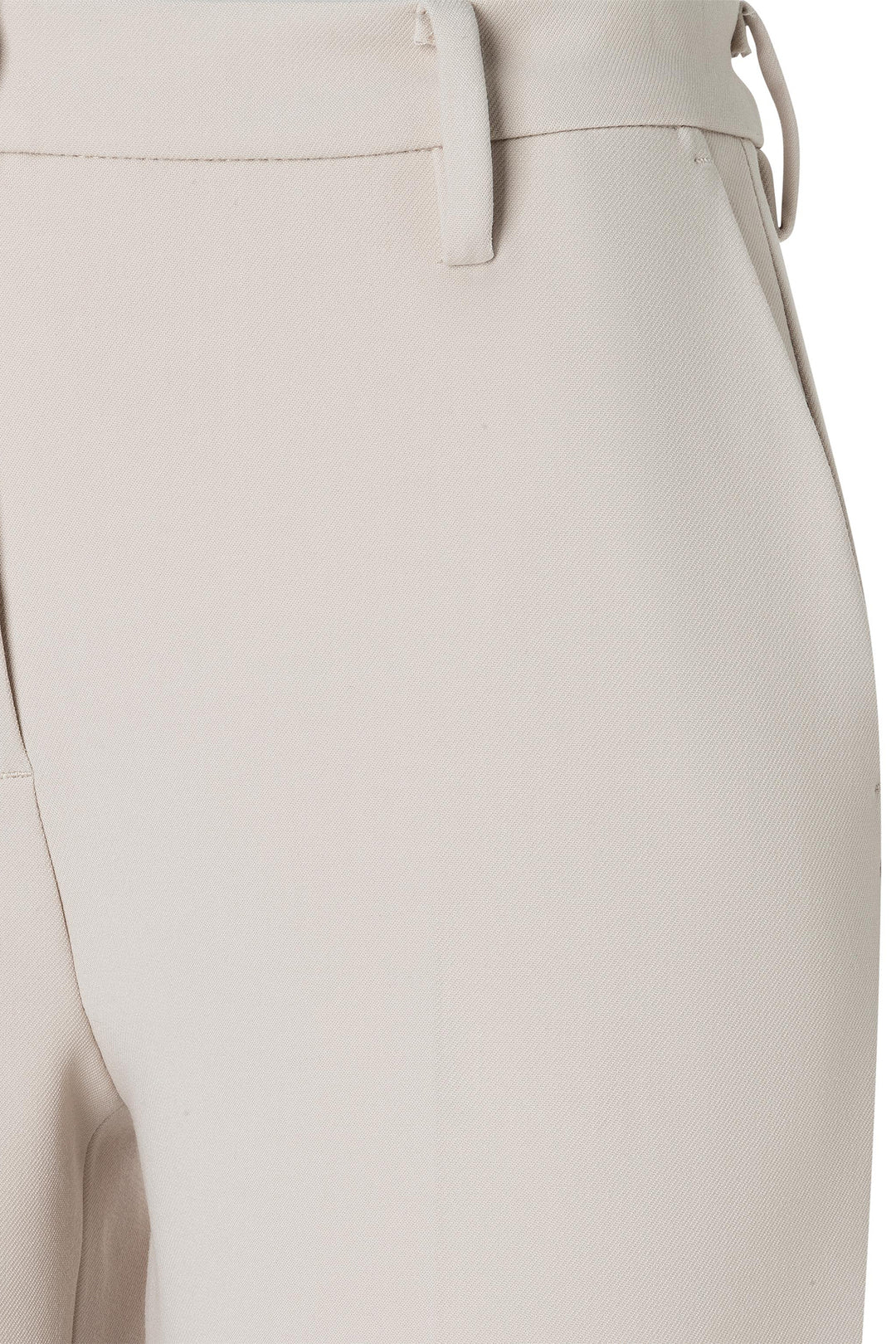 Close-up of beige pants with a belt on a white background