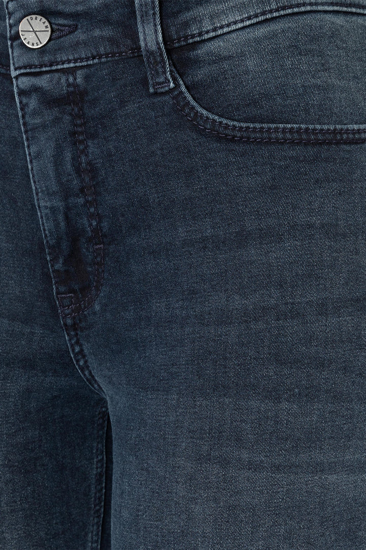 Close-up of blue denim jeans with a button and zipper detail.