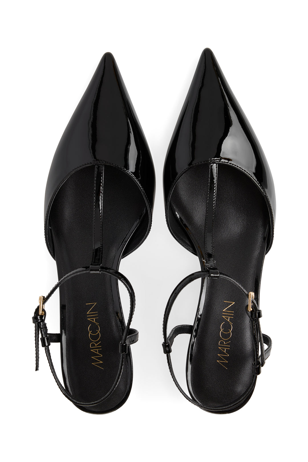 Black patent leather high heels with 'Marciano' branding on a white background