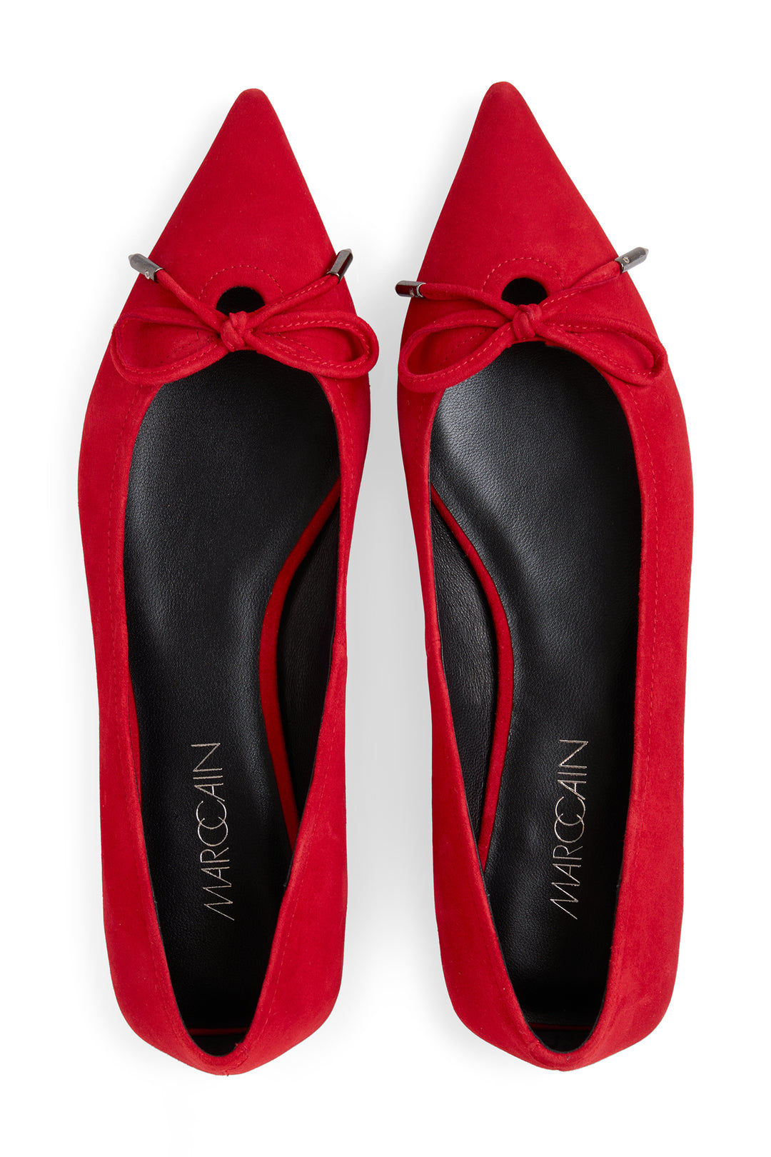 Red pointed-toe shoes with bows on a white background