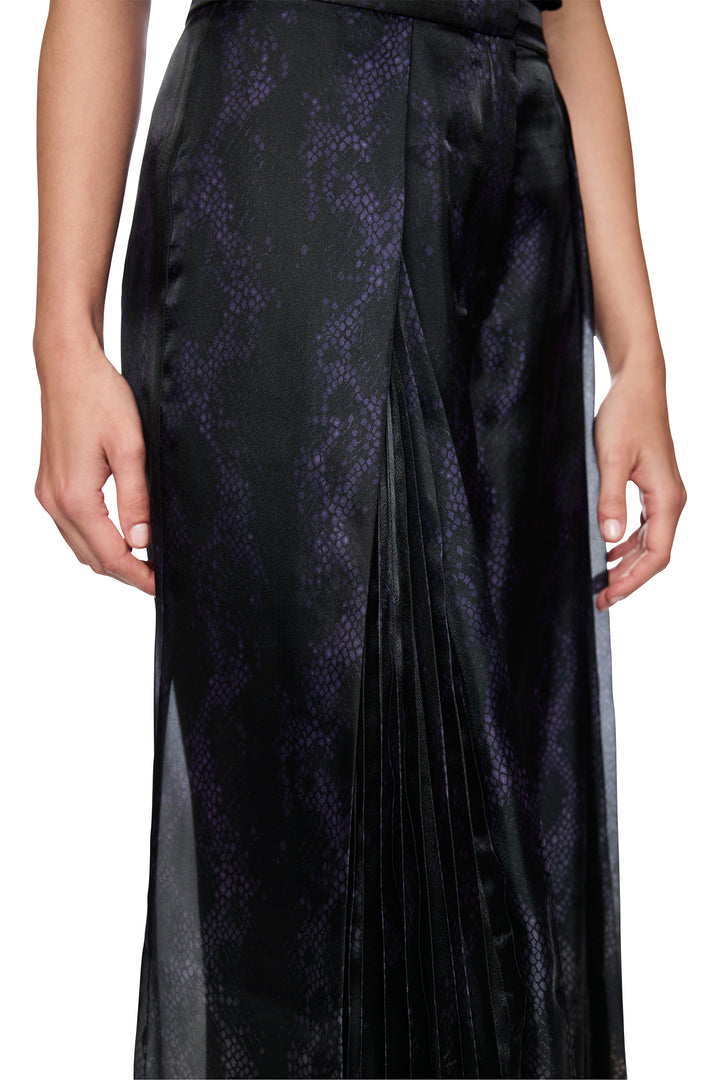 Black satin dress with floral pattern on a white background