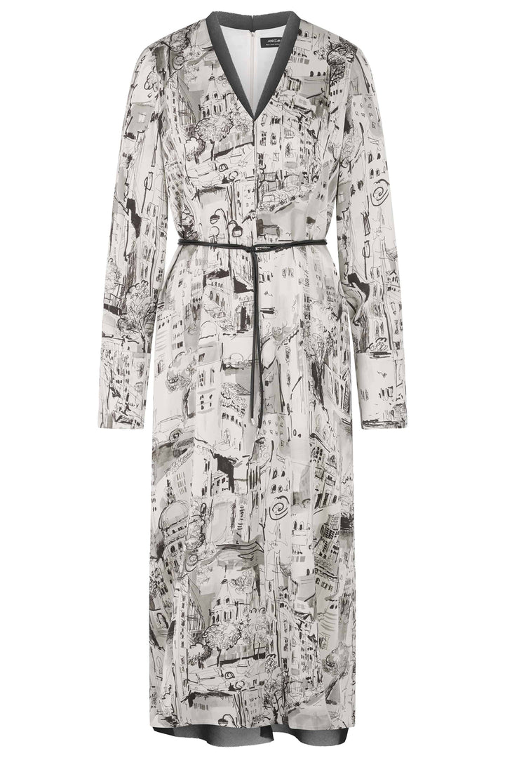 Long dress with newspaper print on a white background