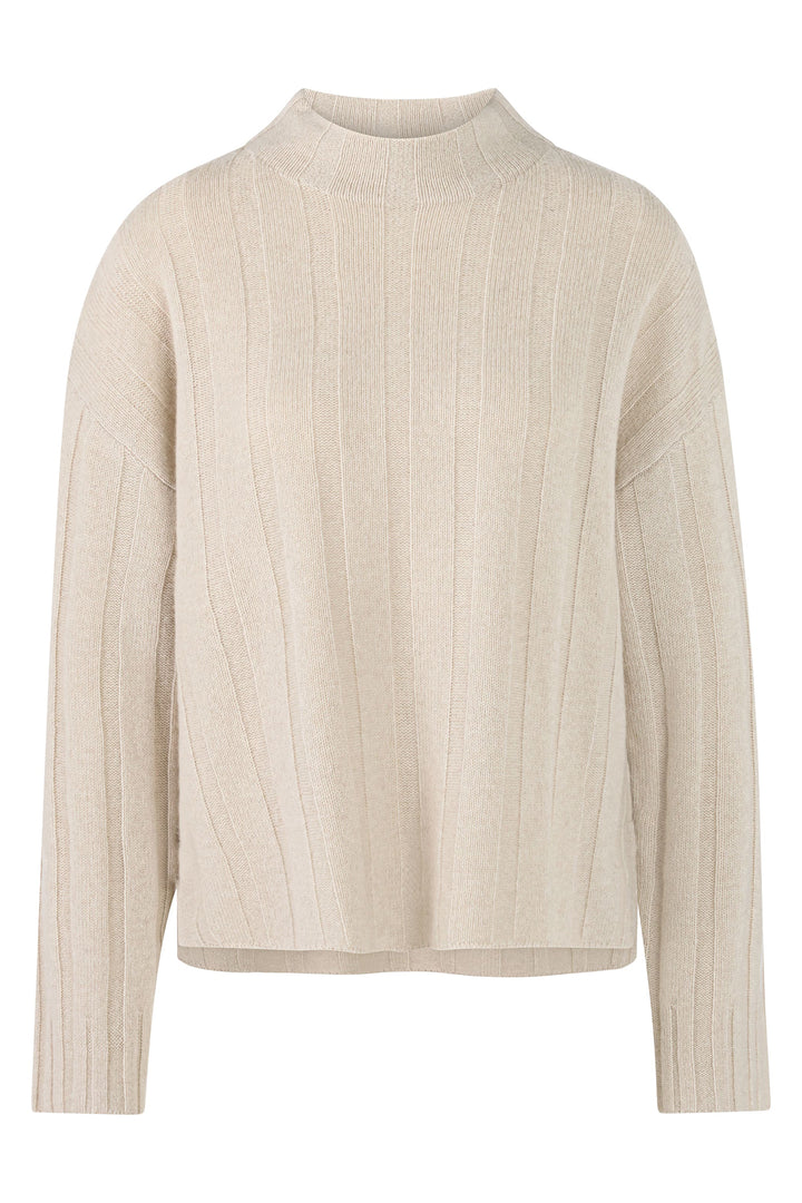 Beige ribbed sweater on a white background