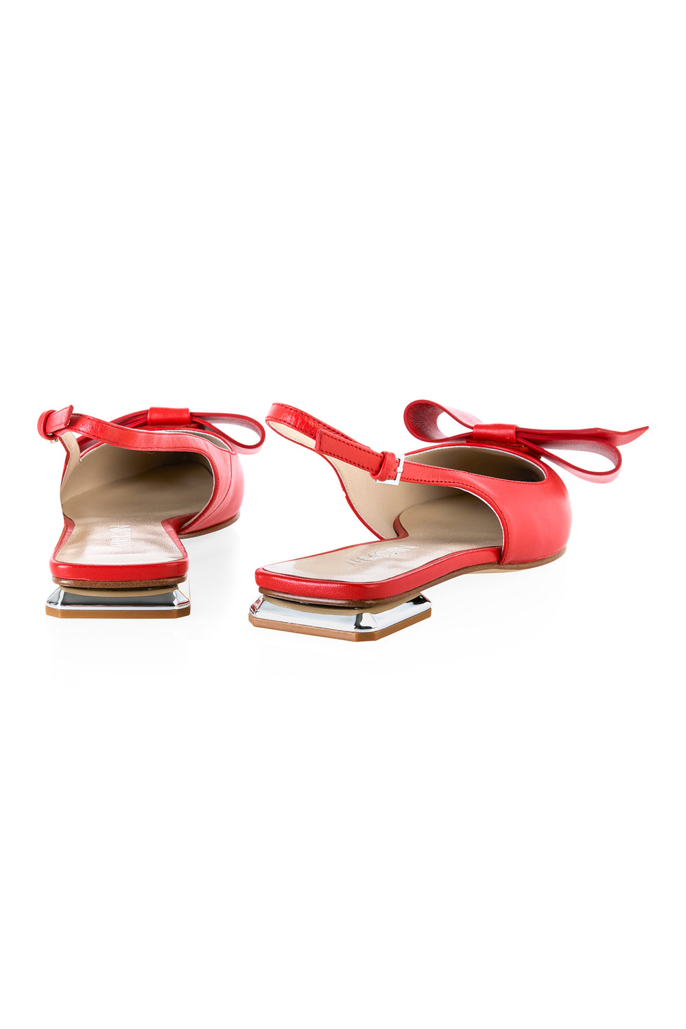 Red high-heeled shoes with open toes on a white background