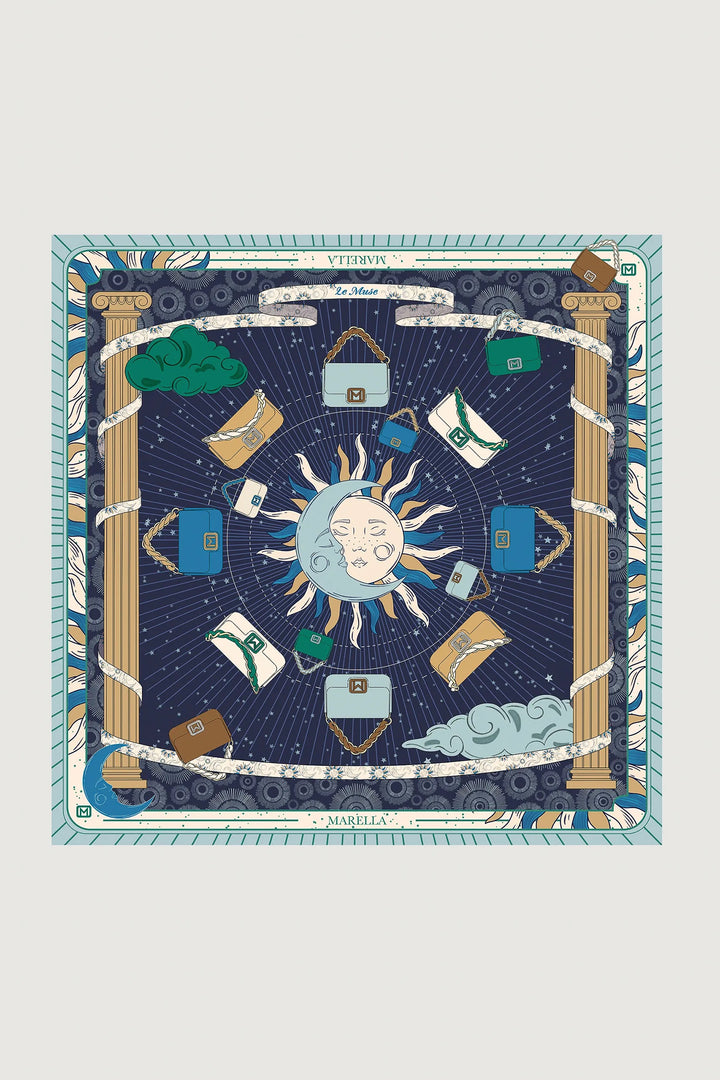 Decorative scarf with sun, moon, and clouds design on a blue background