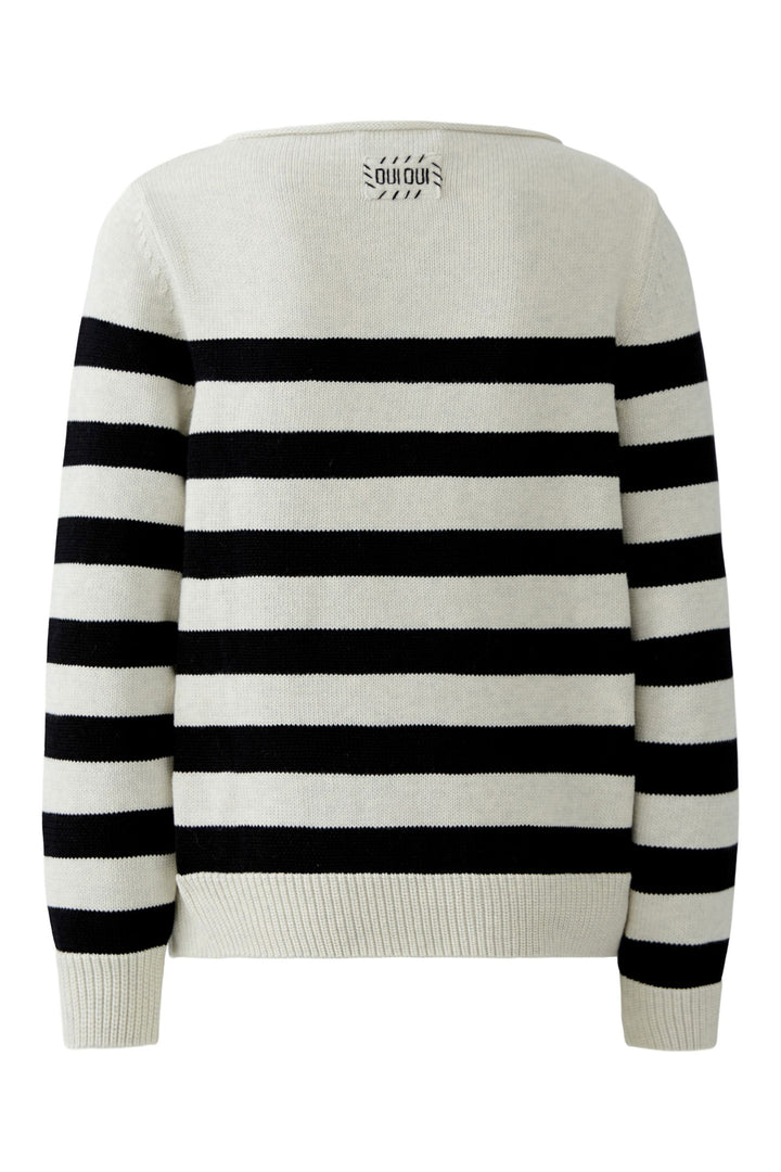 Black and white striped sweater on a white background