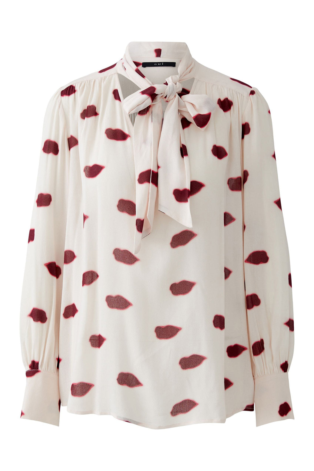 White blouse with red heart patterns on a white background