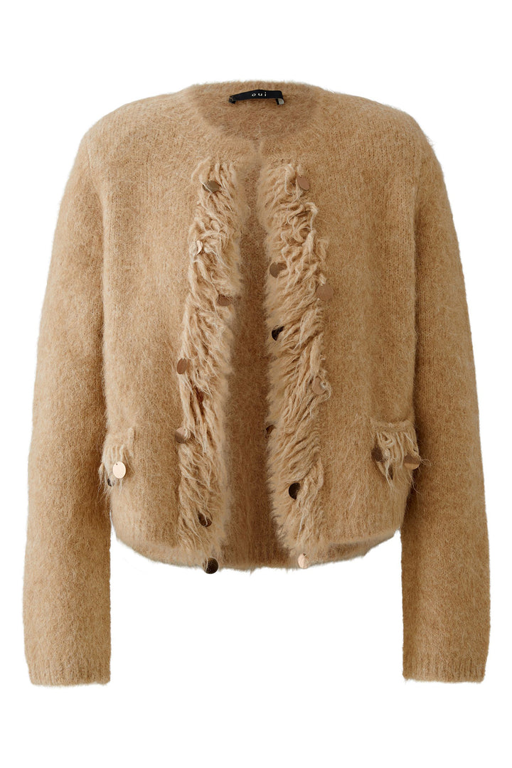 Beige cardigan with frayed details on a white background