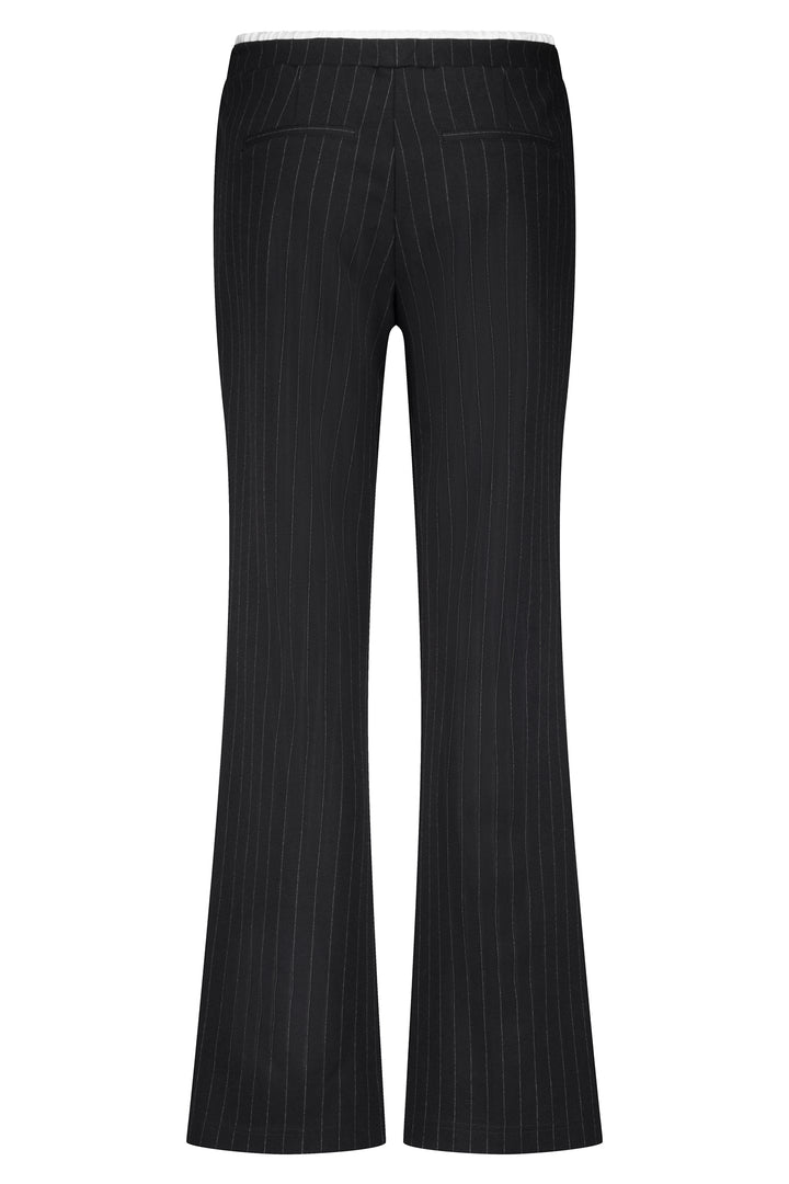 Black pinstripe pants on a white background