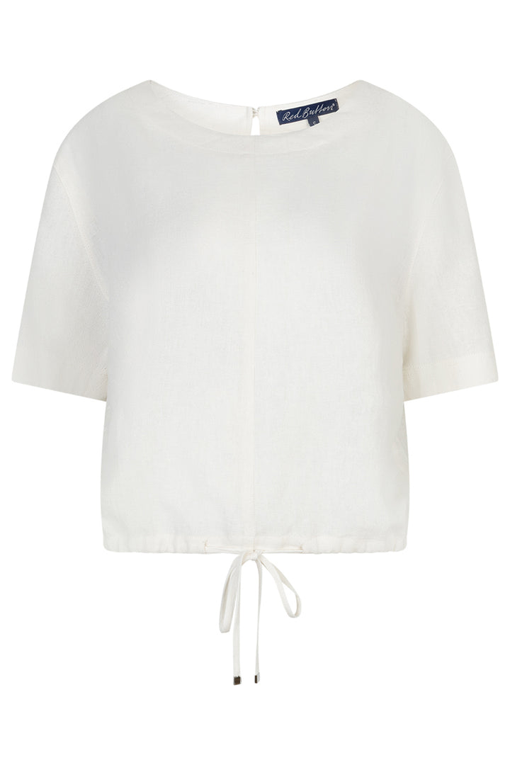 White blouse with a brand label on a white background