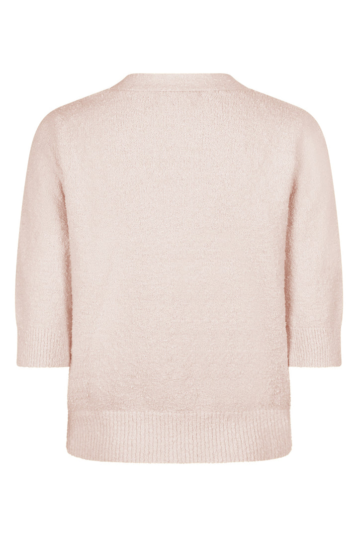 Light pink sweater on a white background