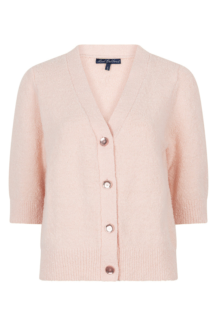 Pink cardigan with button details on a white background