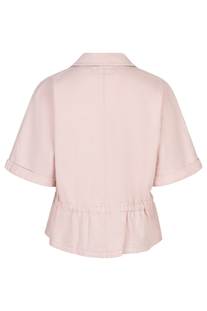 Light pink blouse with short sleeves on a white background