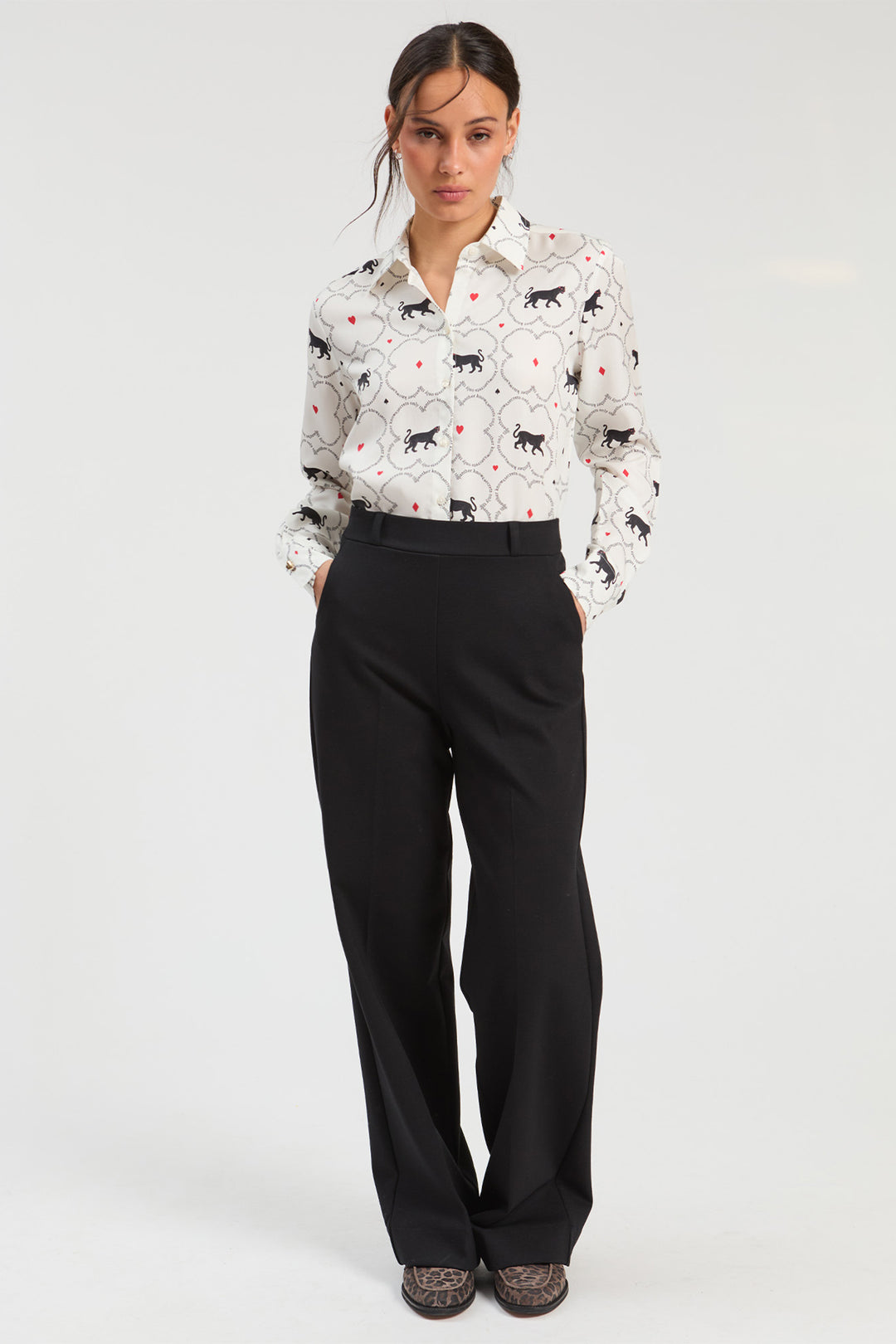Vilagallo Black Punto Roma Trousers, front view styled with a printed blouse